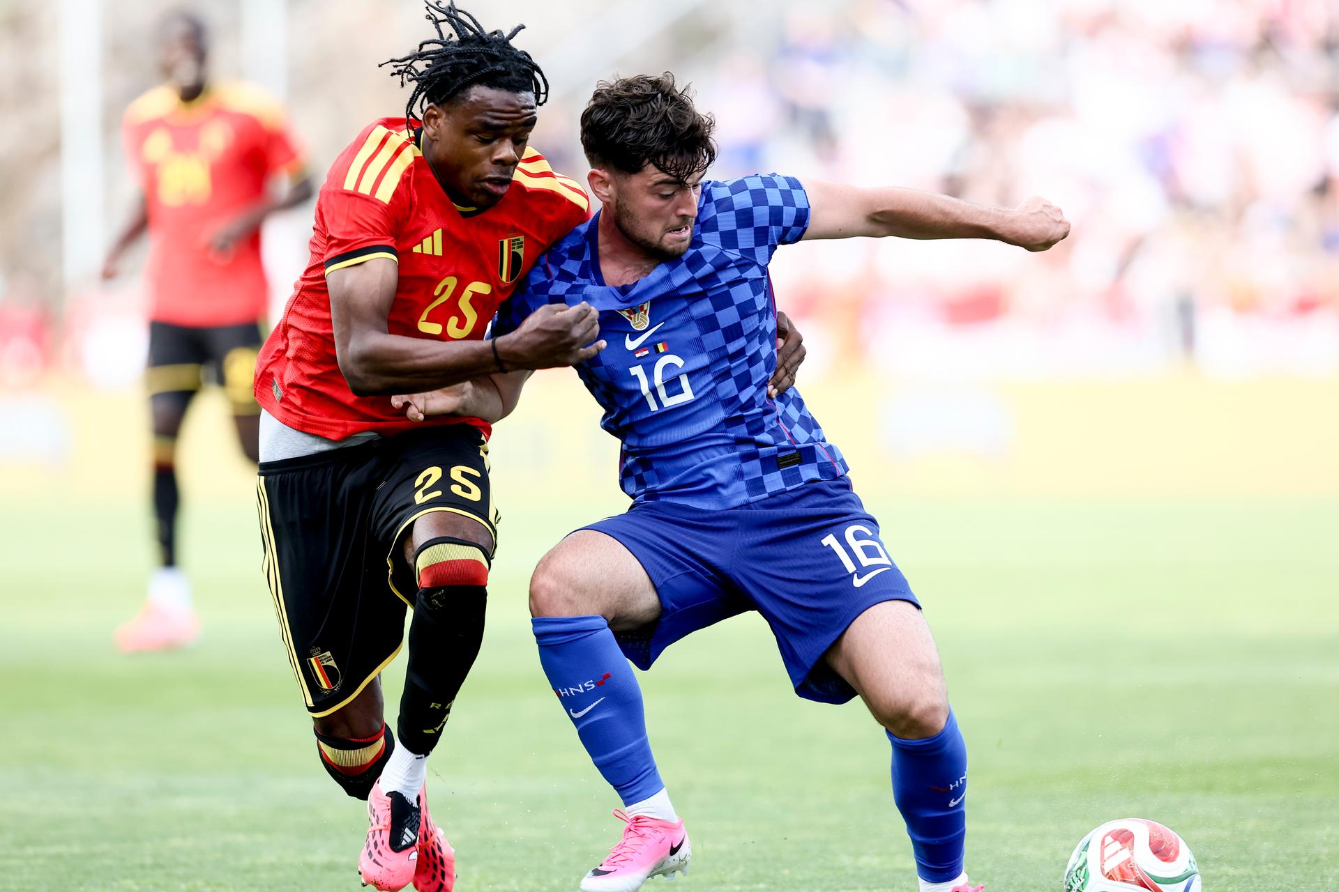 Belgium's Nathan Ngoy and Croatia's Martin Baturina fight for the ball during a friendly soccer game between Croatia and Belgian national soccer team Red Devils, in Rijeka, Croatia, on Tuesday 02 June 2026, part of the preparations for the 2026 FIFA World Cup. BELGA PHOTO BRUNO FAHY