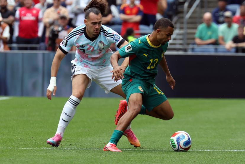 Belgium's Arthur Theate and Senegal's Iliman Ndiaye fight for the ball during a soccer game between Belgian national team Red Devils and Senegal, on Wednesday 01 July 2026, at the Seattle Field, in Seattle, a 1/16 finals game in the FIFA World Cup 2026. BELGA PHOTO BRUNO FAHY