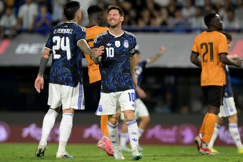 Argentina's forward #10 Lionel Messi gestures next to teammate midfielder #24 Enzo Fernandez during a friendly football match between Argentina and Zambia at La Bombonera stadium in Buenos Aires on March 31, 2026.  JUAN MABROMATA / AFP