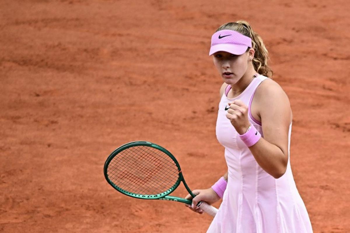 Mirra Andreeva reacts after a point as she plays against Ukraine's Marta Kostyuk during their women's semi final singles match on day 12 of the French Open tennis tournament on Court Philippe-Chatrier at the Roland-Garros Complex in Paris on June 4, 2026.  JULIEN DE ROSA / AFP