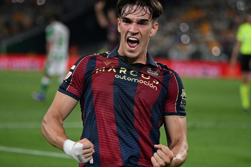 Levante's Spanish forward #19 Carlos Espi Escrihuela celebrates scoring his team's first goal during the Spanish league football match between Real Betis and Levante UD at Benito Villamarin Stadium in Seville on May 23, 2026.  CRISTINA QUICLER / AFP