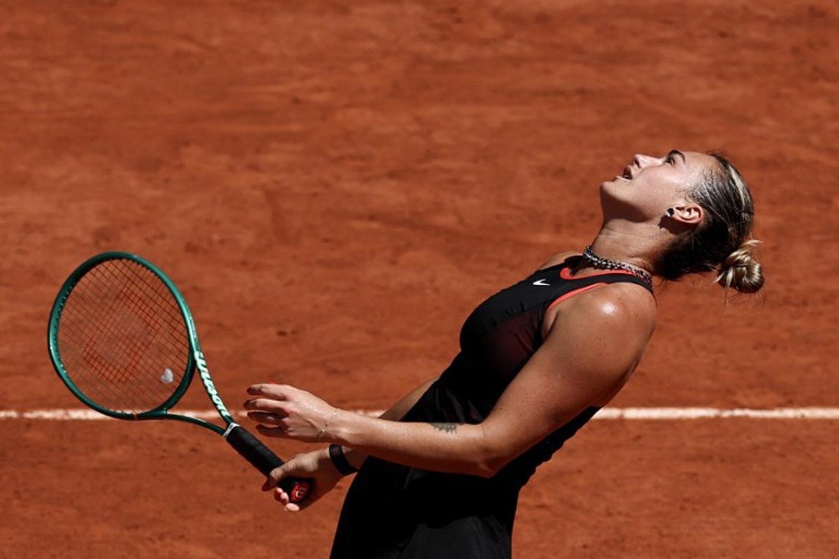 Belarus' Aryna Sabalenka reacts as she plays against Spain's Jessica Bouzas Maneiro during their women's singles match on day 3 of the French Open tennis tournament on Court Philippe-Chatrier at the Roland-Garros Complex in Paris on May 26, 2026.  Anne-Christine POUJOULAT / AFP