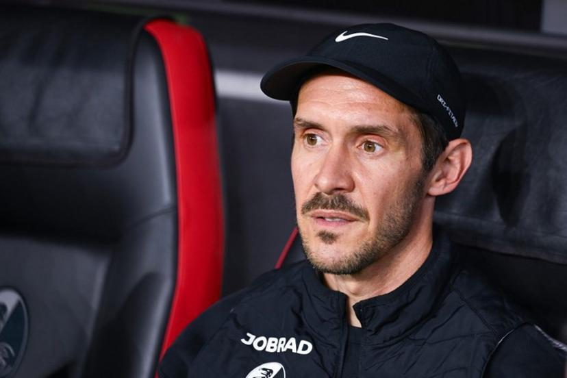 Freiburg's German head coach Julian Schuster sits on the bench prior to the UEFA Europa League semi-final second leg football match between SC Freiburg and SC Braga in Freiburg im Breisgau, southwestern Germany on May 7, 2026.  Silas STEIN / AFP