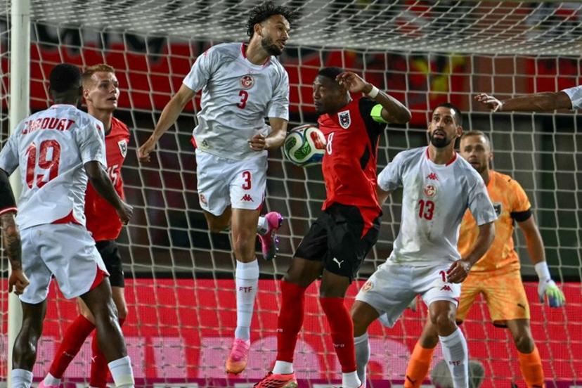 Austria's defender #08 David Alaba and Tunisia's defender #03 Montassar Talbi vie for the ball during the friendly football match between Austria and Tunisia in Vienna, Austria on June 1, 2026 ahead of the 2026 FIFA World Cup football tournament.  Joe Klamar / AFP