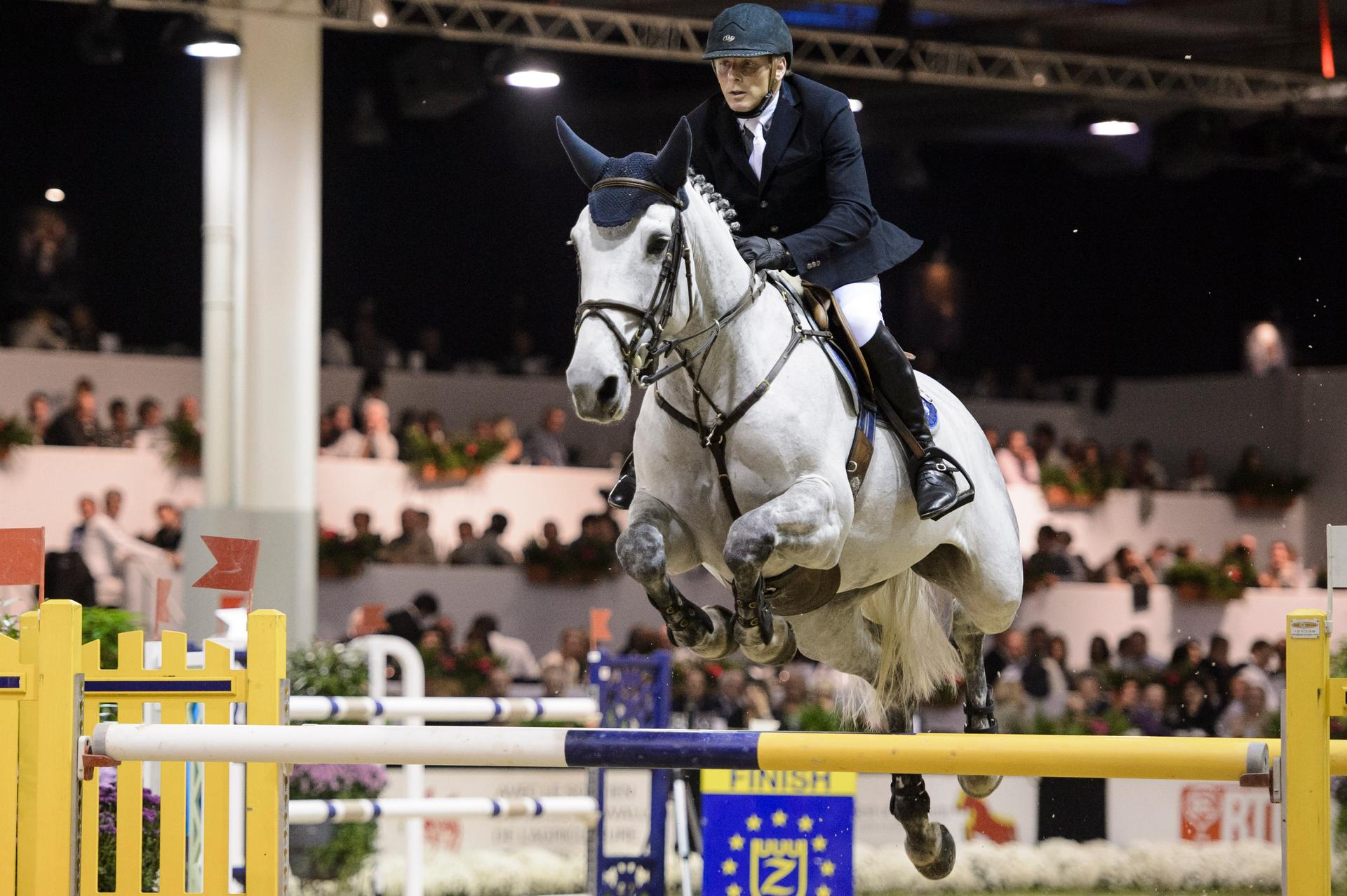 20141102 - LIEGE, BELGIUM: Dirk Demeersman rides STB Fleuri Van De Koekelbert during the 'Jumping International de Liege' equestrian event, in Liege, Sunday 02 November 2014. BELGA PHOTO NICOLAS LAMBERT
