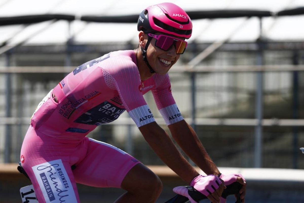 Pink jersey Bahrain - Victorious Portuguese rider Afonso Eulalio rides in the peloton during the 12th stage of the Giro d'Italia 2026 - Tour of Italy cycling race between Imperia and Novi Ligure, Italy, on May 21, 2026.  Luca Bettini / AFP