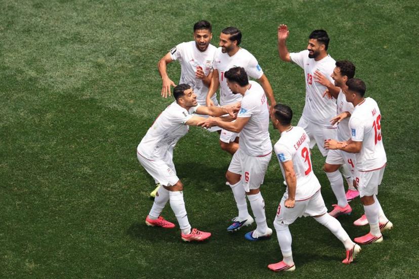 Iran's forward #09 Mehdi Taremi (L) celebrates with teammates a goal which was later disallowed after a VAR review during the 2026 World Cup Group G football match between Belgium and Iran at the Los Angeles Stadium in Inglewood on June 21, 2026.   Etienne Laurent / AFP