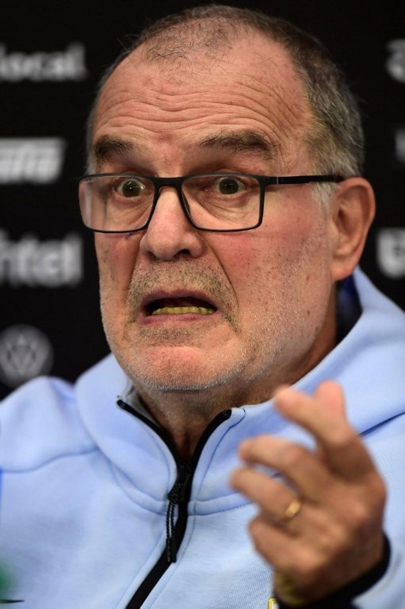 Uruguay's national football team coach, Argentine Marcelo Bielsa, gestures as he speaks during a press conference in Barros Blancos, Canelones department, Uruguay on June 1, 2026. Led by Federico Valverde and with the long-awaited inclusion of veteran goalkeeper Fernando Mulsera, Marcelo Bielsa on May 31 made official the list of 26 players who will represent La Celeste at the World Cup, which kicks off in ten days in North America. Dante FERNANDEZ / AFP