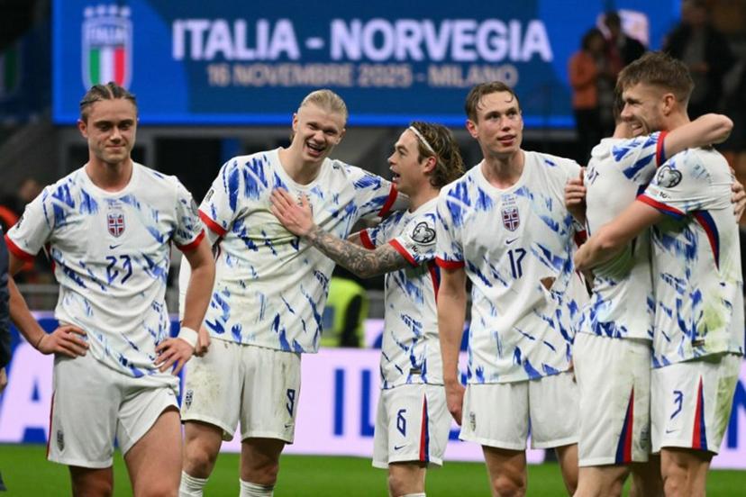 from left : Norway's midfielder #23 Thelo Aasgaard, Norway's  captain #09 Erling Braut Haaland, Norway's  midfielder #06 Patrick Berg and Norway's  defender #17 Torbjorn Lysaker Heggem celebrate their victory at the end of the FIFA World Cup 2026 European qualification football match between Italy and Norway, at the San Siro Stadium, in Milan, on November 16, 2025.     Alberto PIZZOLI / AFP