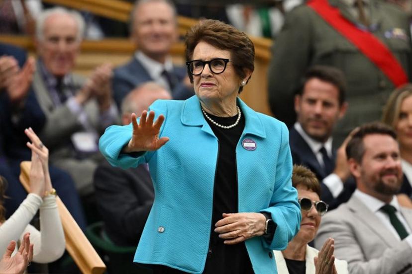 US former tennis player Billie Jean King waves to the crowd from the Royal box ahead of the men's singles third round tennis match between Italy's Jannik Sinner and Spain's Pedro Martinez on the sixth day of the 2025 Wimbledon Championships at The All England Lawn Tennis and Croquet Club in Wimbledon, southwest London, on July 5, 2025.  Glyn KIRK / AFP