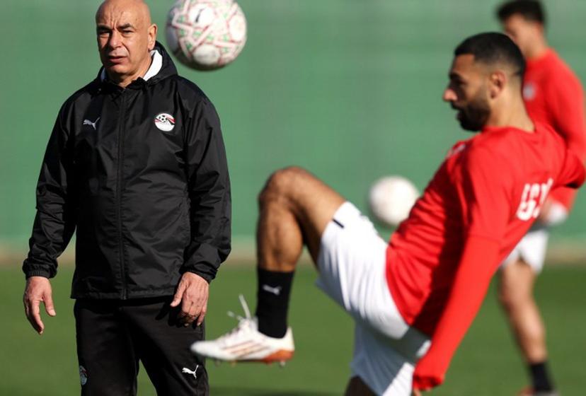 Egypt's head coach Hossam Hassan (L) and Egypt's forward #10 Mohamed Salah attend a training session at the Stadium in Taghzout, Morocco, on December 25, 2025, on the eve of the 2025 Africa Cup of Nations (CAN) football match between Egypt and South Africa.  FRANCK FIFE / AFP