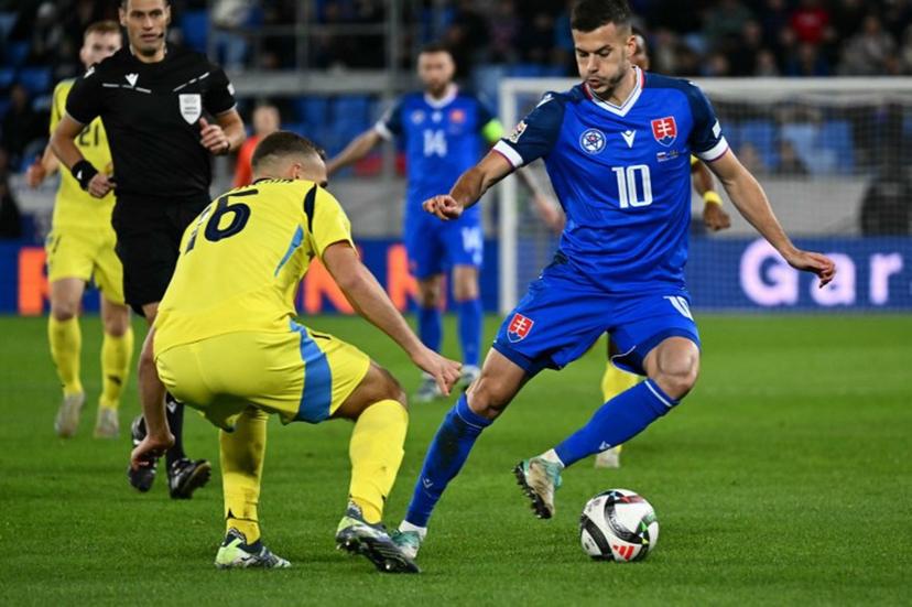 Slovakia's midfielder #10 Laszlo Benes (R) and Sweden's midfielder #16 Jesper Karlstroem vie for the ball during the UEFA Nations League, League C Group C1 football match  Slovakia vs Sweden, in Bratislava on October 11, 2024.  Joe Klamar / AFP