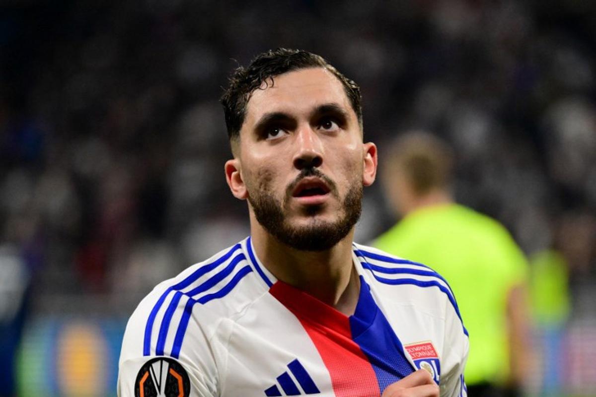 Lyon's French midfielder #18 Rayan Cherki celebrates scoring his team's second goal during the UEFA Europa League Quarter final first leg football match between Olympique Lyonnais (OL) and Manchester United at the Parc Olympique Lyonnais Groupama stadium in Decines-Charpieu, central-eastern France, on April 10, 2025.  Olivier CHASSIGNOLE / AFP
