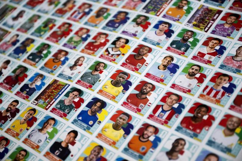 This picture shows a sheet of stickers ready to be trimmed and packaged, featuring football players for the upcoming 2026 FIFA World Cup hosted by the US, Canada and Mexico, at the Panini Group factory in Modena, northern Italy, on April 28, 2026.  The Panini Group holds the exclusive rights for the official collectible cards and stickers for the 2026 FIFA World Cup hosted by the US, Canada, and Mexico. MARCO BERTORELLO / AFP
