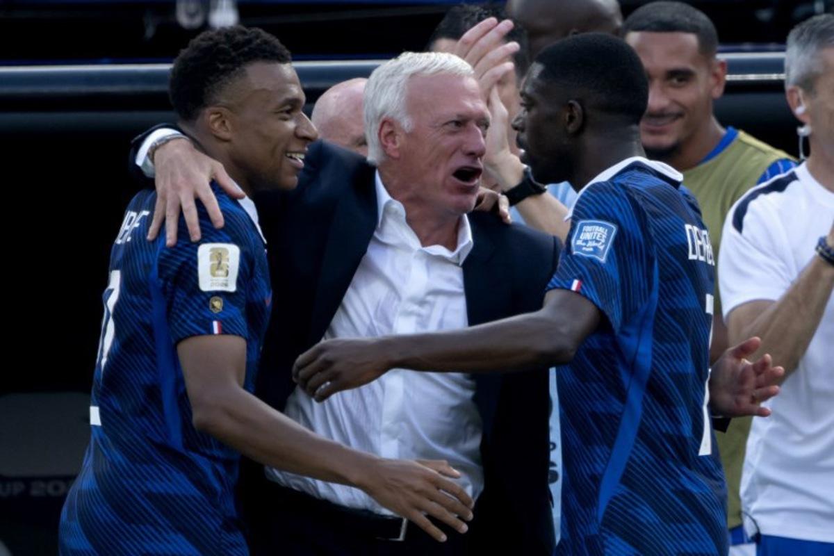 France's head coach Didier Deschamps celebrates with France's forward #10 Kylian Mbappe (L) and France's forward #07 Ousmane Dembele after the team scored the first goal during the 2026 World Cup round of 32 football match between France and Sweden at the New York/New Jersey Stadium in East Rutherford on June 30, 2026.   Pedro UGARTE / AFP