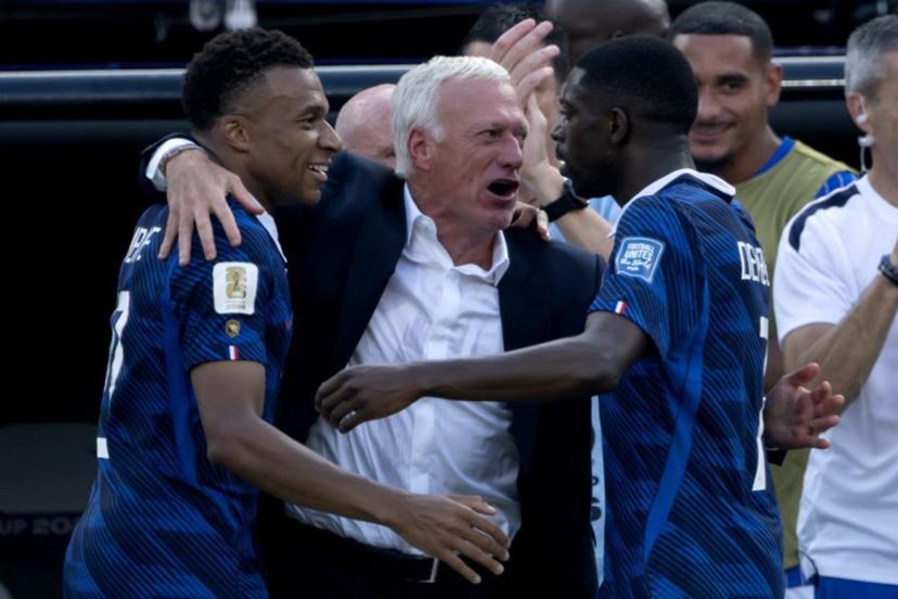 France's head coach Didier Deschamps celebrates with France's forward #10 Kylian Mbappe (L) and France's forward #07 Ousmane Dembele after the team scored the first goal during the 2026 World Cup round of 32 football match between France and Sweden at the New York/New Jersey Stadium in East Rutherford on June 30, 2026.   Pedro UGARTE / AFP