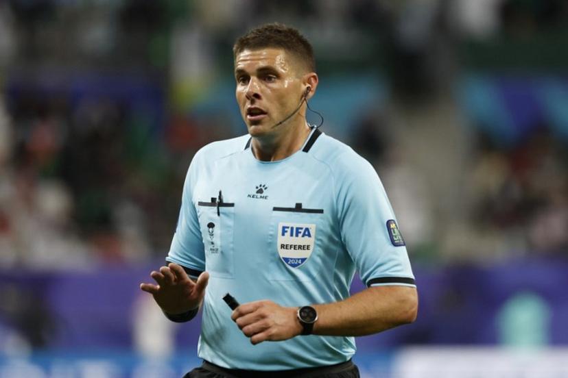 Australian referee Shaun Evans gestures during the Qatar 2023 AFC Asian Cup Group F football match between Saudi Arabia and Oman at the Khalifa International Stadium in Doha on January 16, 2024.  KARIM JAAFAR / AFP