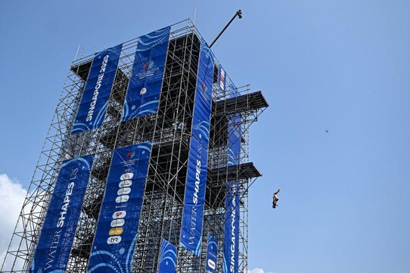 Italy's Elisa Cosetti competes in the women's high diving rounds during the 2025 World Aquatics Championships at the Sentosa Island in Singapore on July 24, 2025.  Manan VATSYAYANA / AFP