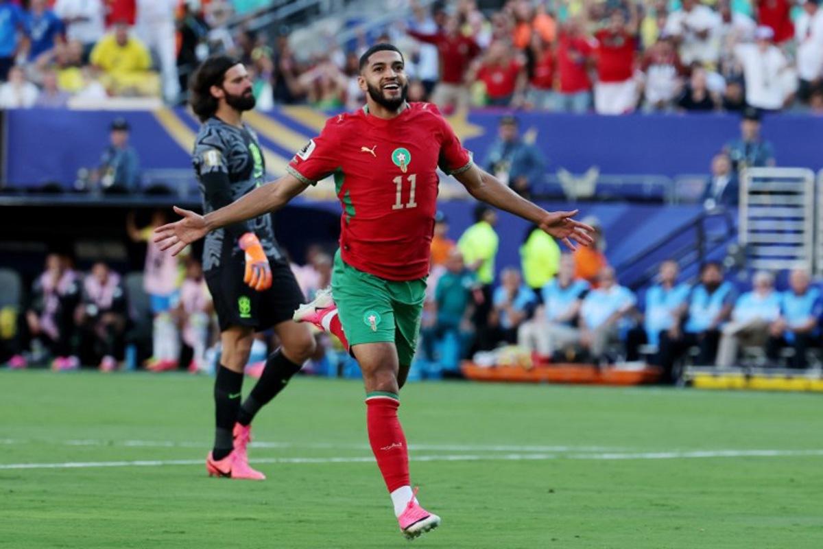 Morocco's midfielder #11 Ismael Saibari celebrates scoring his team's first goal during the 2026 World Cup Group C football match between Brazil and Morocco at the New York/New Jersey Stadium in East Rutherford on June 13, 2026.  TIMOTHY A. CLARY / AFP
