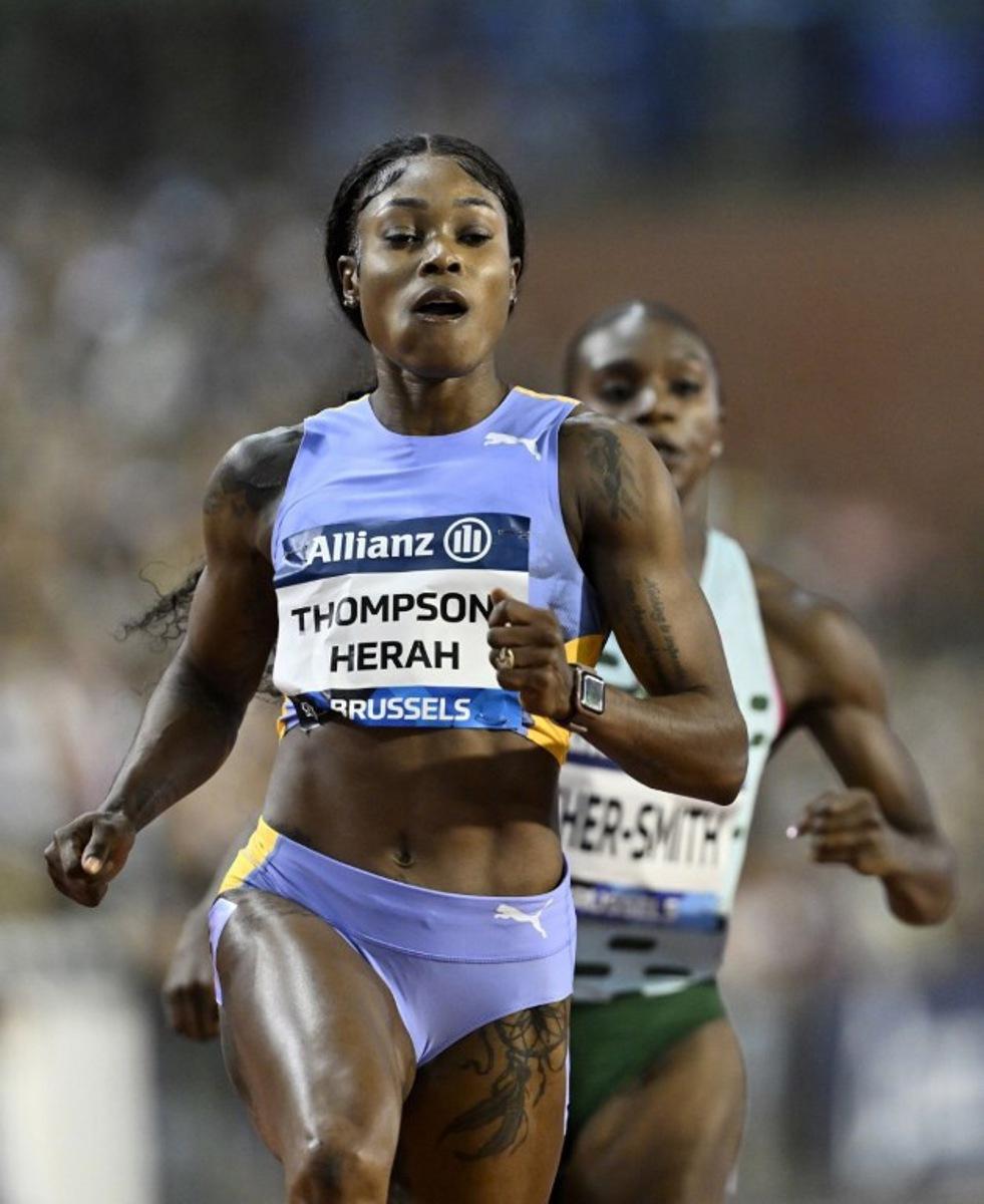 Jamaica's Elaine Thompson-Herah reacts as she wins the Women 100m event of the Brussels IAAF Diamond League athletics meeting on September 8, 2023 at the King Baudouin stadium.  JOHN THYS / AFP