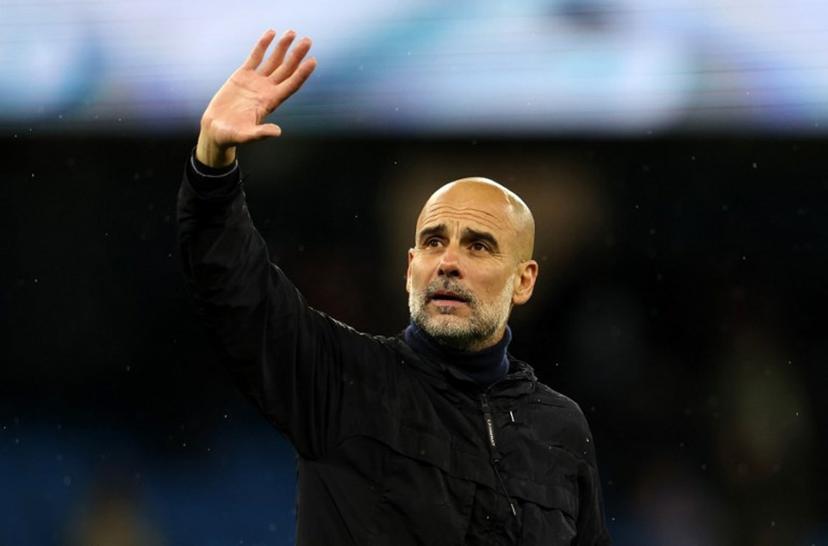 Manchester City's Spanish manager Pep Guardiola waves to the fans following the English Premier League football match between Manchester City and Crystal Palace at the Etihad Stadium in Manchester, north west England, on May 13, 2026.  Darren Staples / AFP