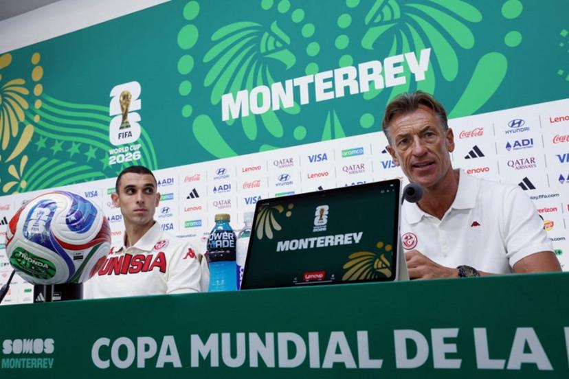 Tunisia's French head coach Herve Renard (R) and midfielder #17 Ellyes Skhiri give an MD-1 press conference at the Monterrey Stadium in Guadalupe, Mexico on June 19, 2026, on the eve of the 2026 World Cup Group F football match between Tunisia and Japan.   Julio Cesar AGUILAR / AFP