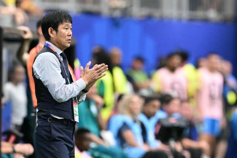 Japan's head coach Hajime Moriyasu applauds his players during the 2026 World Cup round of 32 football match between Brazil and Japan at the Houston Stadium in Houston on June 29, 2026.   RONALDO SCHEMIDT / AFP