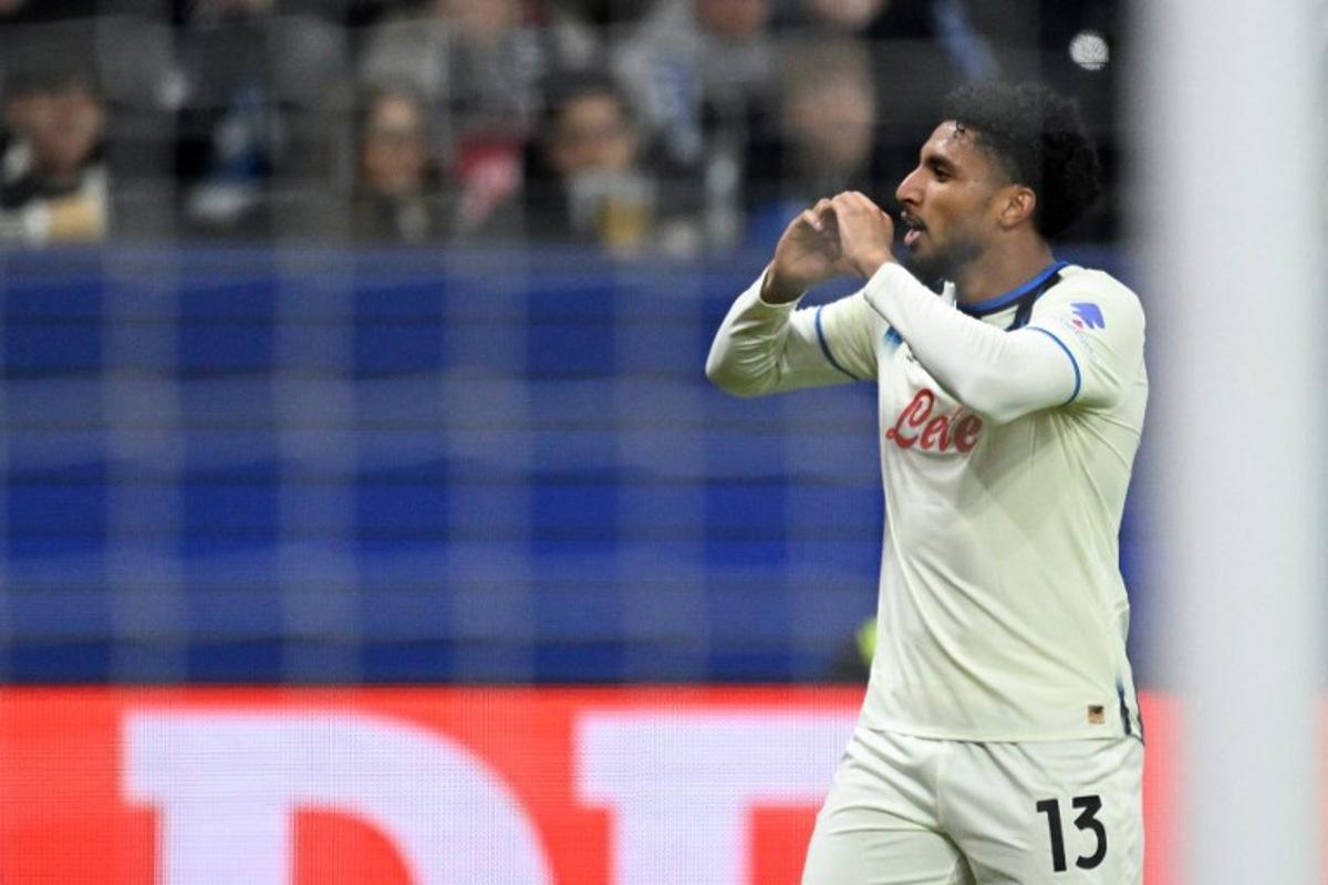 Atalanta's Brazilian midfielder #13 Ederson celebrates scoring his team's second goal during the UEFA Champions League league phase day 5 football match between Eintracht Frankfurt and Atalanta Bergamo in Frankfurt, Germany, on November 26, 2025.  Kirill KUDRYAVTSEV / AFP