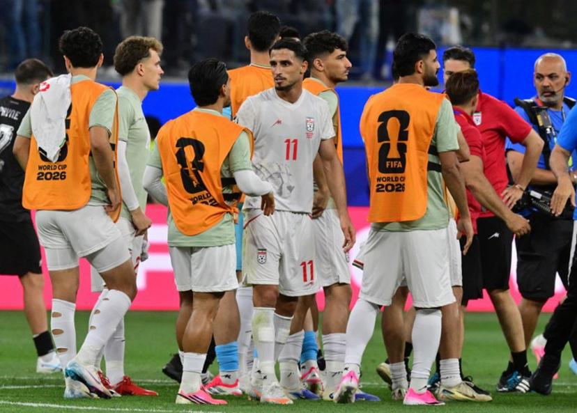 Iran's forward #11 Ali Alipour and teammates react after the 2026 World Cup Group G football match between Iran and New Zealand at Los Angeles Stadium in Inglewood on June 15, 2026.   Frederic J. Brown / AFP