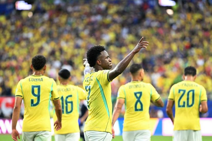 Brazil's forward #07 Vinicius Junior celebrates after scoring his team's second goal during the 2026 World Cup Group C football match between Scotland and Brazil at the Miami Stadium in Miami Gardens on June 24, 2026.   CHANDAN KHANNA / AFP