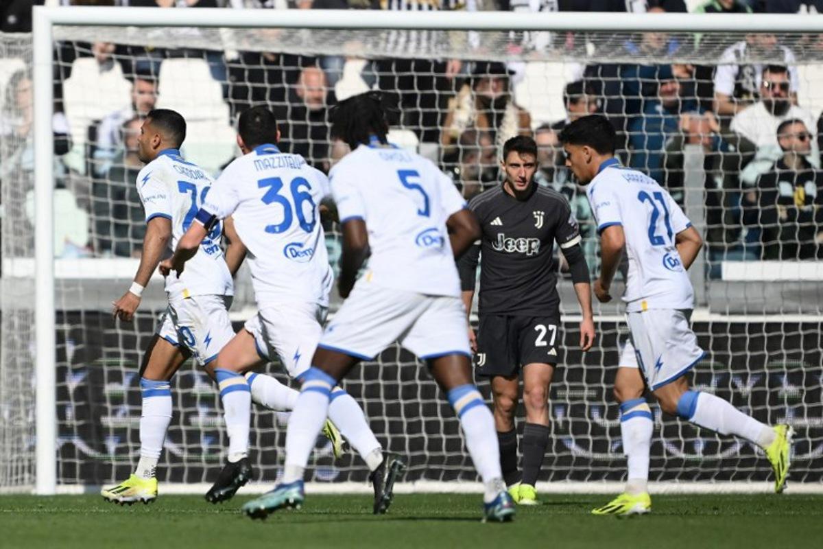 Frosinone's Moroccan forward Walid Cheddira (L) celebrates after scoring a goal during the Italian Serie A football match Juventus vs Frosinone on February 25, 2024 at the "Allianz Stadium" in Turin.  MARCO BERTORELLO / AFP