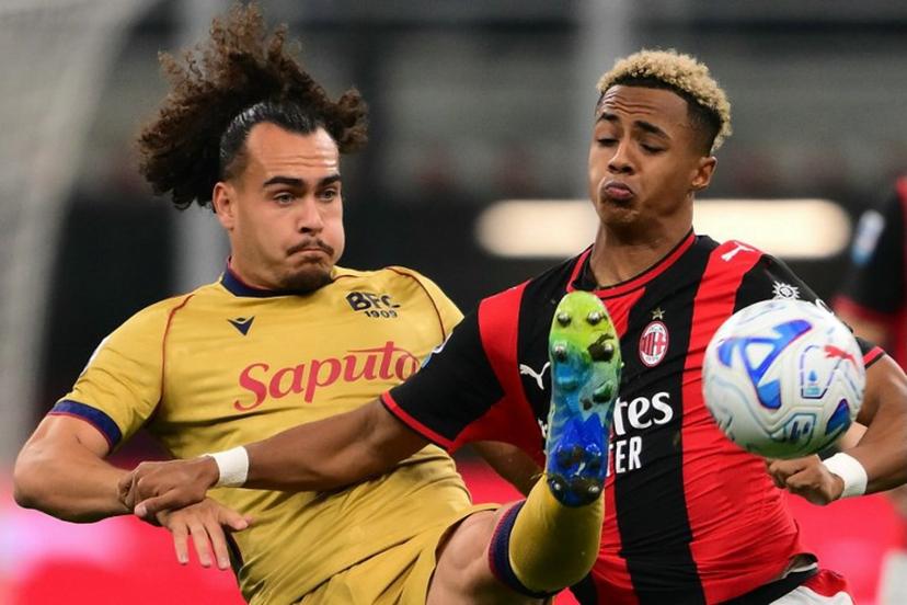 Ac Milan's English midfielder #20 Omari Hutchinson (R) fights for the ball with Bologna's Belgian defender #3 Arthur Theate (L) during the Italian Serie A football match between AC Milan and Bologna at the San Siro stadium in Milan, northern Italy on October 28, 2026.  Marco Bertorello / AFP