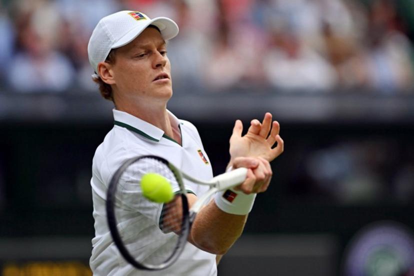 Italy's Jannik Sinner returns the ball to Serbia's Miomir Kecmanovic during their men's singles first round tennis match on the first day of the 2026 Wimbledon Championships at The All England Lawn Tennis and Croquet Club in Wimbledon, southwest London, on June 29, 2026.  Glyn KIRK / AFP