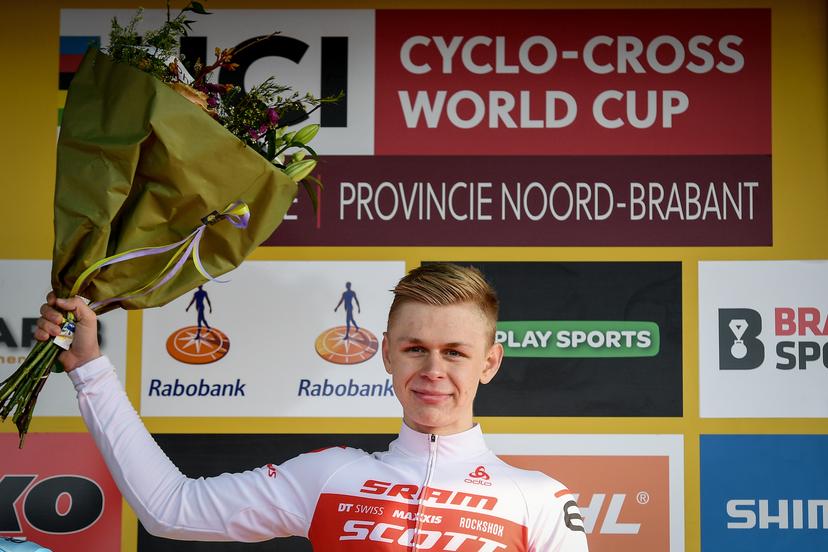 Swiss Dario Lillo celebrates on the podium after winning the junior's race of the World Cup cyclocross in Hoogerheide, the Netherlands, the 9th and last stage of the UCI World Cup competition, Sunday 26 January 2020. BELGA PHOTO DAVID STOCKMAN