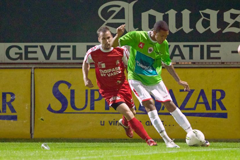 20110920 - KORTRIJK, BELGIUM: Kortrijk's Peter Czvitkovics and Antwerp's Marvin Peersman in action during the Cofidis Cup 1/16 final match between KV Kortrijk and Antwerp, in Kortrijk, Tuesday 20 September 2011. BELGA PHOTO KURT DESPLENTER