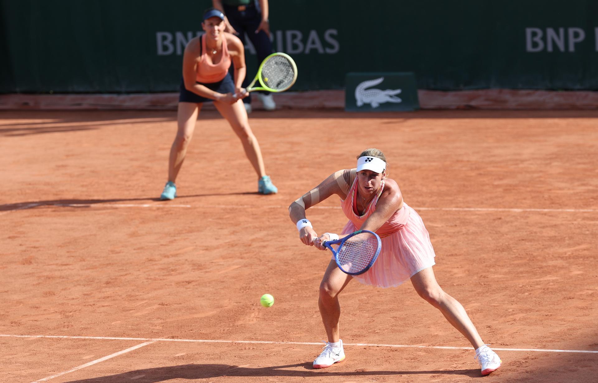 Slovenian Andreja Klepac and Belgian Magali Kempen pictured in action during a doubles tennis match between Belgian-Slovenian pair Kempen-Klepac and US-Italian pair Muhammad-Stollar, in the first round of the women's doubles at the Roland Garros French Open tennis tournament, in Paris, France, Thursday 28 May 2026. This year's tournament takes place from 18 May to 07 June. BELGA PHOTO VIRGINIE LEFOUR