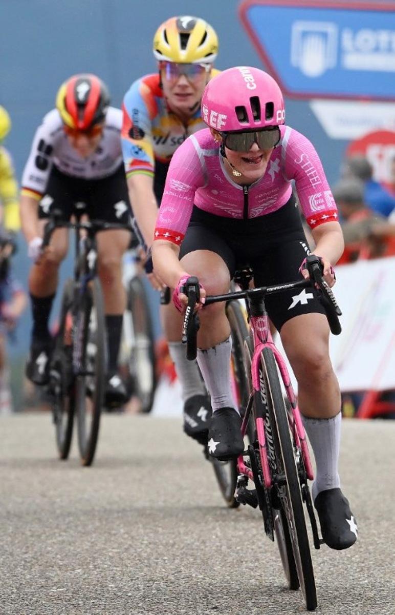 Team EF Education - Cannondale's Swiss rider Noemi Ruegg arrives at the finish in first place followed by Team Boels - Dolmans Cyclingteam's Belgian rider Lotte Kopecky and Team FDJ - SUEZ's German rider Franziska Koch, at the end of the first stage of the 2026 La Vuelta Femenina cycling tour of Spain, a 113.9 km race between Marin and Salvaterra do Mino, on May 3, 2026.   Miguel RIOPA / AFP