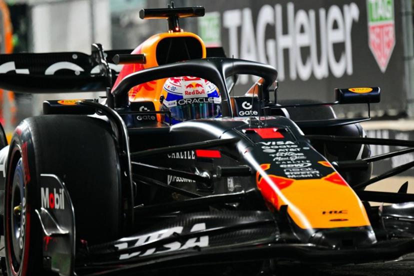 Red Bull Racing's Dutch driver Max Verstappen drives out of the pit lane during the qualifying session ahead of the Abu Dhabi Formula One Grand Prix at the Yas Marina Circuit in Abu Dhabi on December 6, 2025.  Andrej ISAKOVIC / AFP