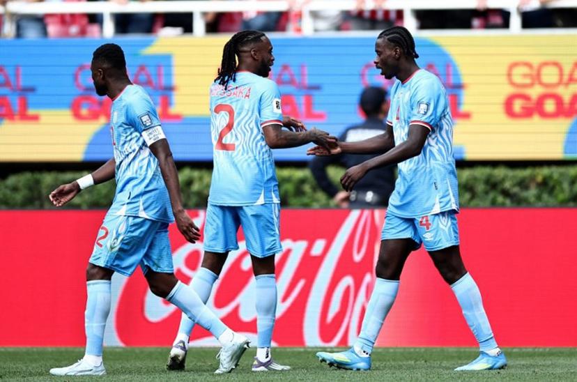 DR Congo's defender #04 Axel Tuanzebe (R) celebrates with teammate defender #02 Aaron Wan-Bissaka after scoring a goal in extra time during the 2026 FIFA World Cup qualifiers final playoff football match between the Democratic Republic of the Congo and Jamaica at the Akron Stadium in Zapopan, Jalisco state, Mexico, on March 31, 2026.  Ulises Ruiz / AFP