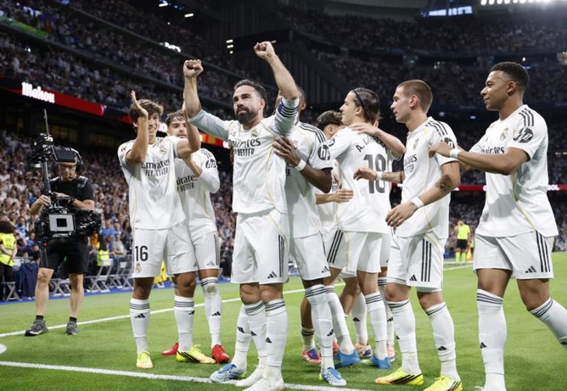 Real Madrid's Spanish defender #02 Dani Carvajal celebrates Real Madrid's Spanish forward #16 Gonzalo Garcia's goal during the Spanish league football match between Real Madrid CF and Athletic Club Bilbao at Santiago Bernabeu Stadium in Madrid on May 23, 2026.  Pierre-Philippe MARCOU / AFP