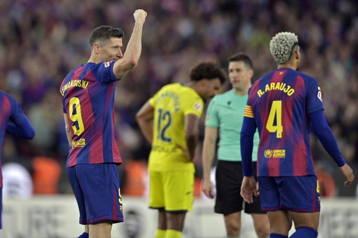 Barcelona's Polish forward #09 Robert Lewandowski celebrates scoring his team's fourth goal during the Spanish league football match between FC Barcelona and Villarreal CF at Camp Nou Stadium in Barcelona on February 28, 2026.  MANAURE QUINTERO / AFP