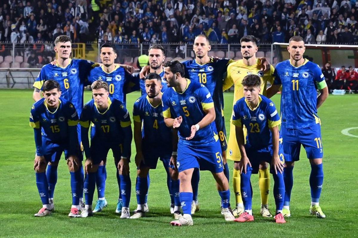 (Top L-R) Bosnia and Herzegovina's midfielder #06 Benjamin Tahirovic, Bosnia and Herzegovina's forward #20 Haris Hajradinovic, Bosnia and Herzegovina's defender #03 Ermin Bicakcic, Bosnia and Herzegovina's defender #18 Nikola Katic, Bosnia and Herzegovina's goalkeeper #01 Nikola Vasilj, Bosnia and Herzegovina's forward #11 Edin Dzeko, (bottom L-R) Bosnia and Herzegovina's midfielder #15 Armin Gigovic, Bosnia and Herzegovina's midfielder #17 Dzenis Burnic, Bosnia and Herzegovina's defender #04 Jusuf Gazibegovic, Bosnia and Herzegovina's defender #05 Sead Kolasinac and Bosnia and Herzegovina's midfielder #23 Esmir Bajraktarevic pose prior to the  UEFA Nations League, League A - Group 3, football match between Bosnia and Herzegovina and Hungary at the Bilino Polje Stadium in Zenica, in Zenica, on October 14, 2024.  Elvis Barukcic / AFP