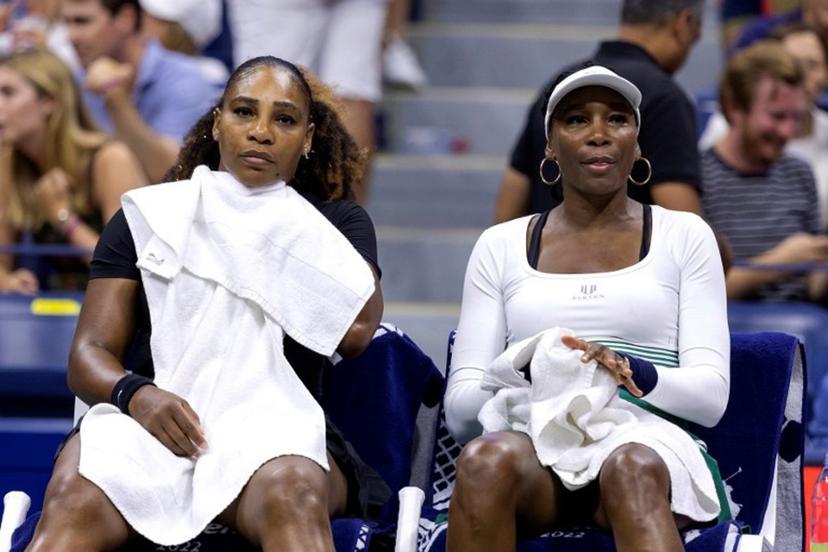 USA's Serena Williams (L) and Venus Williams sit on the bench between games as they play against Czech Republic's Lucie Hradecka and Linda Noskova during their 2022 US Open Tennis tournament women's doubles first round match at the USTA Billie Jean King National Tennis Center in New York, on September 1, 2022.  COREY SIPKIN / AFP