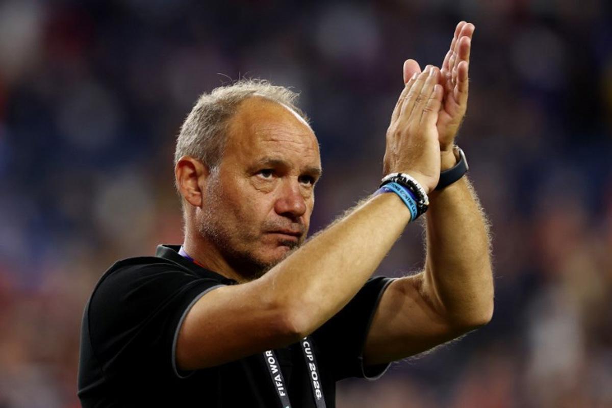 Haiti's French head coach Sebastien Migne acknowledges the crowd after losing the 2026 World Cup Group C football match between Haiti and Scotland at the Boston Stadium in Foxborough on June 13, 2026.  FRANCK FIFE / AFP