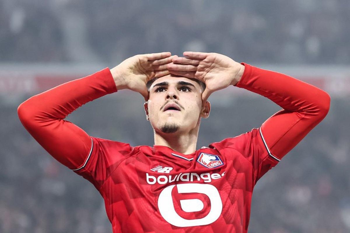 Lille's Belgian forward #07 Matias Fernandez-Pardo gestures to to Lens after scoring Lille's third goal from the penalty spot during the French L1 football match between Lille LOSC and RC Lens at the Stade Pierre-Mauroy in Villeneuve-d'Ascq, northern France, on April 4, 2026.  Sameer Al-DOUMY / AFP
