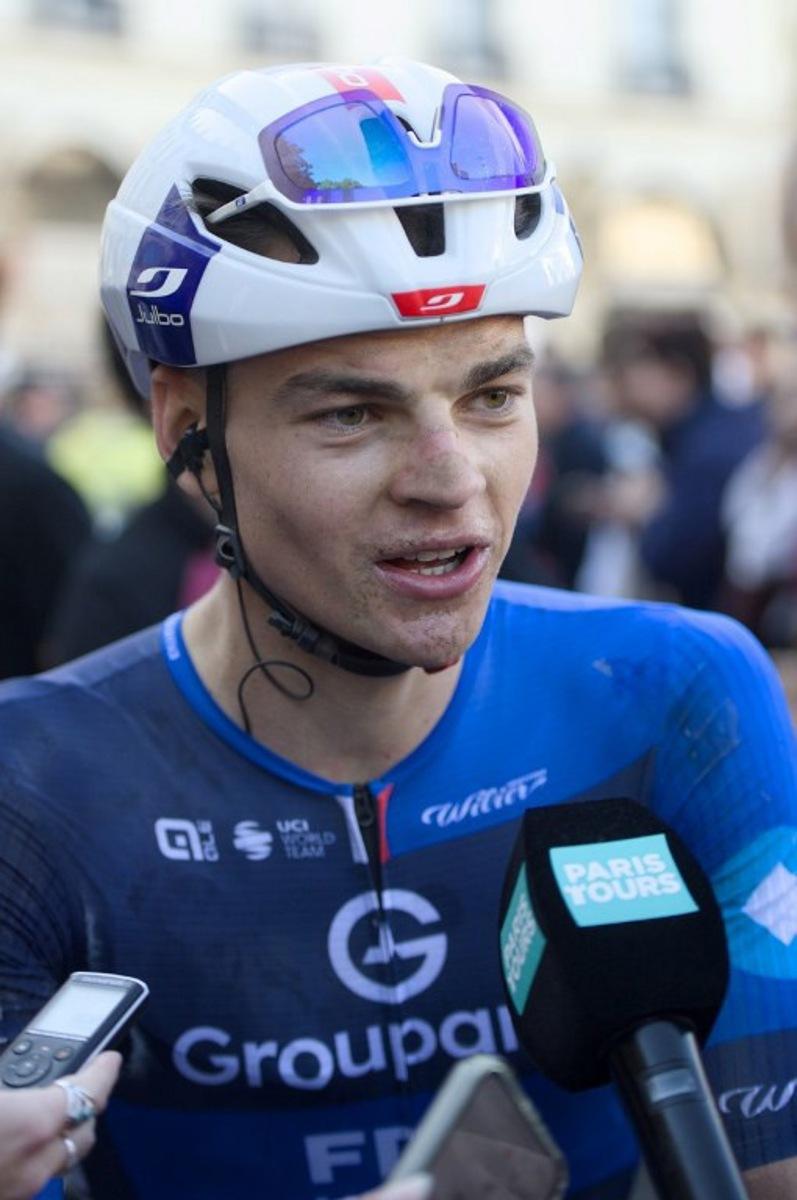 Groupama-FDJ team's French rider Thibaud Gruel delivers remarks to media after the 119th edition of the 211,6 km Paris-Tours one day cycling race, in Tours, central France on October 12, 2025.  GUILLAUME SOUVANT / AFP