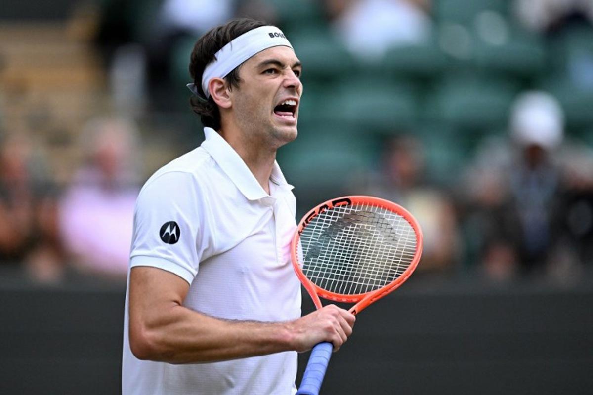 US player Taylor Fritz celebrates winning against Kazakhstan's Alexander Bublik during their men's singles round of 16 tennis match on the eighth day of the 2026 Wimbledon Championships at The All England Lawn Tennis and Croquet Club in Wimbledon, southwest London, on July 6, 2026.  Kirill KUDRYAVTSEV / AFP