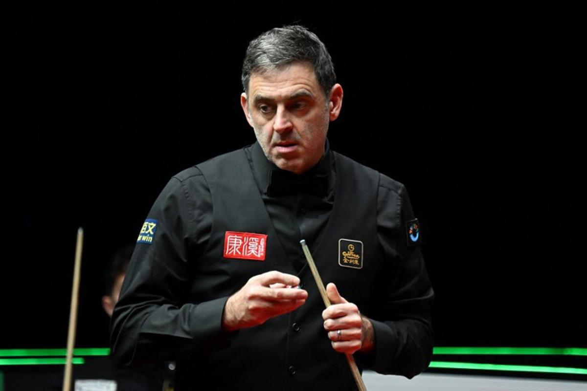 Britain's Ronnie O'Sullivan prepares to play a shot against compatriot Joe O'Connor in round 1 of the Snooker World Grand Prix 2026 in Hong Kong on February 4, 2026.  Peter PARKS / AFP