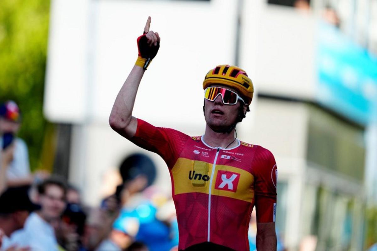 Norway's Soren Waerenskjold reacts after winning the second stage of the PostNord Tour of Denmark (Danmark Rundt) in Gladsaxe, Denmark, on August 13, 2025.  Mads Claus Rasmussen / Ritzau Scanpix / AFP