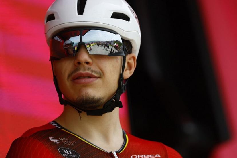 Lotto Intermarche Belgian rider Arnaud De Lie looks on during the presentation of the teams prior the 1st stage of the Giro d'Italia 2026 - Tour of Italy cycling race between Nessebar and Burgas, Bulgaria, on May 8, 2026.  Luca Bettini / AFP
